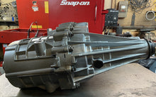 Load image into Gallery viewer, Chevy GMC UPGRADED TRANSFER CASE NP261HD ALUM REAR CASE REBUILT  No Core Charge
